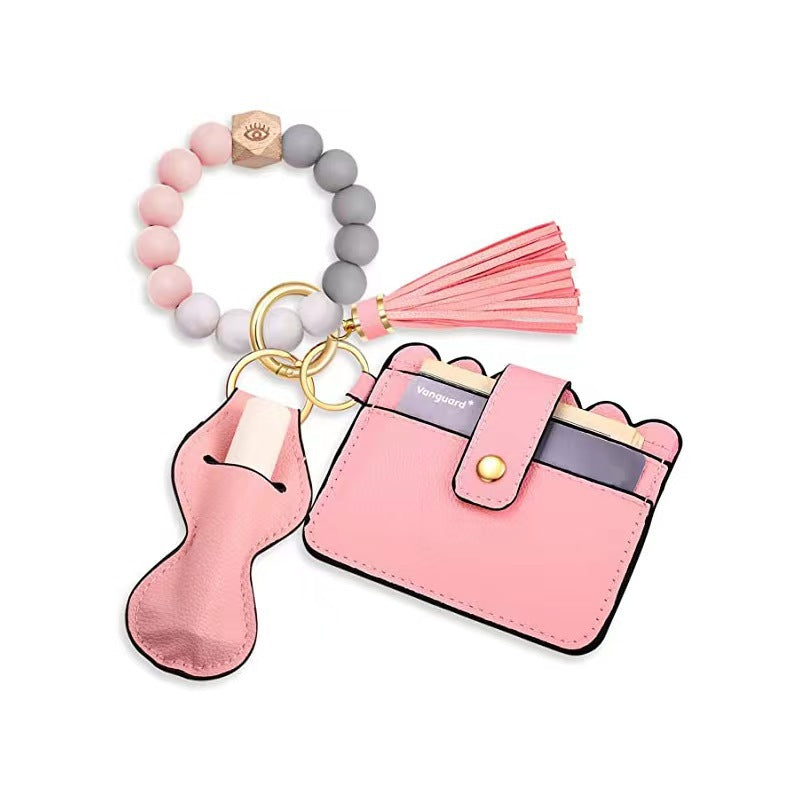 Venta al por mayor Titular de la tarjeta Pulsera de borla Llavero de silicona